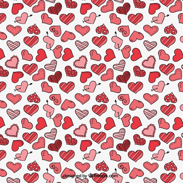 Gratis vector romantische patroon met verschillende harten
