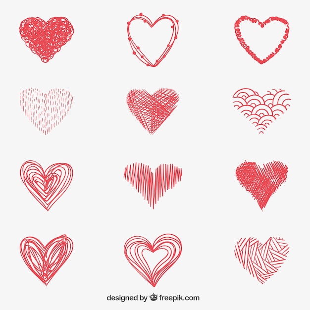 Gratis vector schetsmatige rode harten