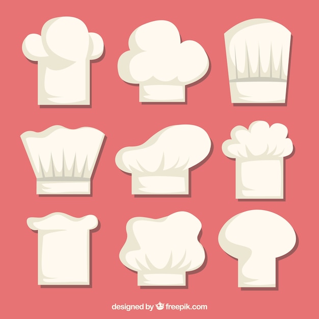 Gratis vector selectie van chef-kok hoeden in plat ontwerp
