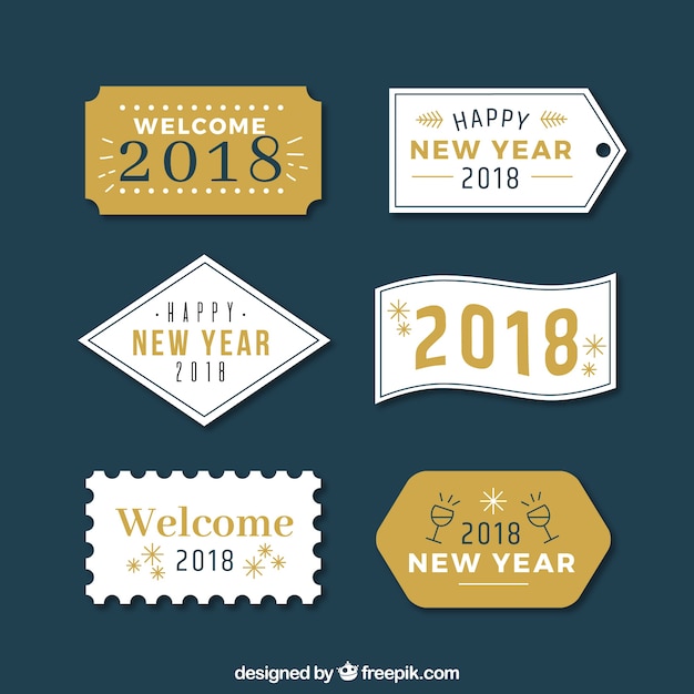 Gratis vector set geel en wit nieuwjaar labels