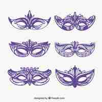 Gratis vector set hand getrokken carnaval maskers