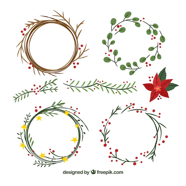 Gratis vector set met handgetekende kerstkransen