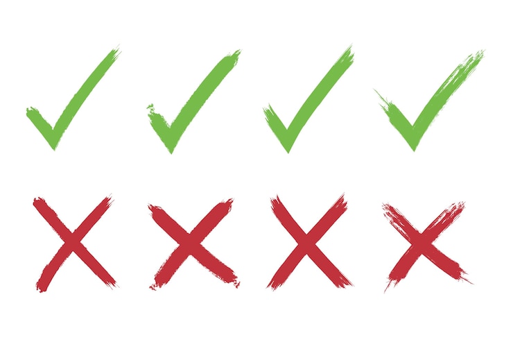 Gratis Vector set met met de hand getekende checkmarks en kruisen