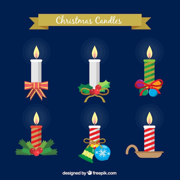 Gratis vector set van decoratieve kaarsen met kerst elementen