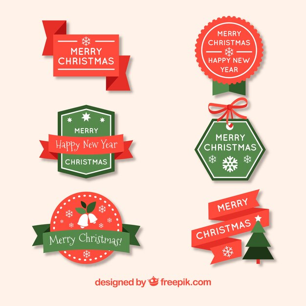 Gratis vector set van elegante kerstmis badges in plat ontwerp