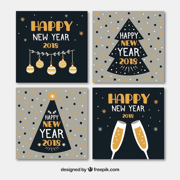 Gratis vector set van vier hand getrokken kaarten van het nieuwe jaar 2018
