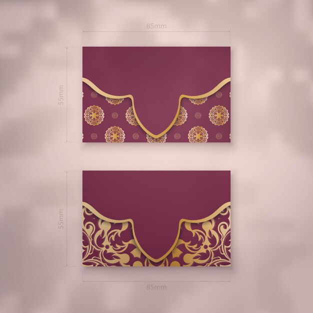 Sjabloon voor visitekaartjes van bourgondië met indiase gouden patroon voor uw bedrijf. Premium Vector