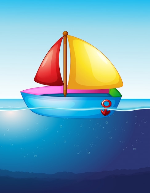 Speelgoed boot drijvend op het water