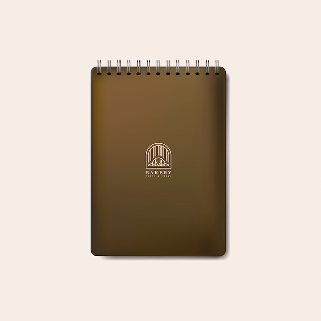 Gratis vector spiraal bruin notebook mockup geïsoleerde vector