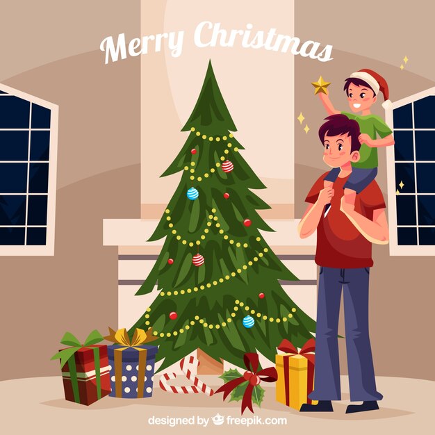 Vader en zoon versieren van een kerstboom