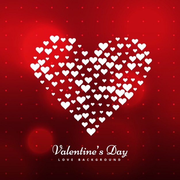 Gratis vector valentine achtergrond met hart gemaakt met hartjes
