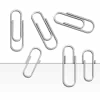 Gratis vector vectorillustratie van paperclip set geïsoleerd en met schaduw op papier