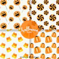 Gratis vector verpakking van vier aquarel halloween patronen