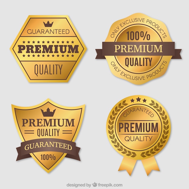 Gratis vector verpakking van vier premium vintage gouden stickers