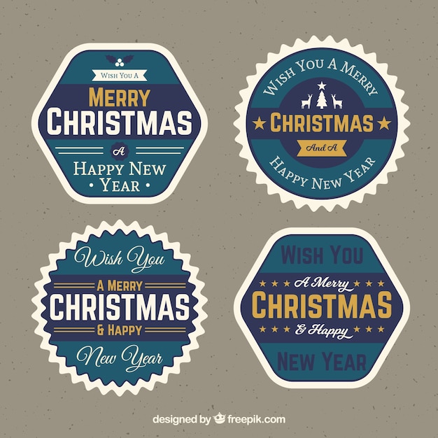 Gratis vector verpakking van vier retro kerststickers