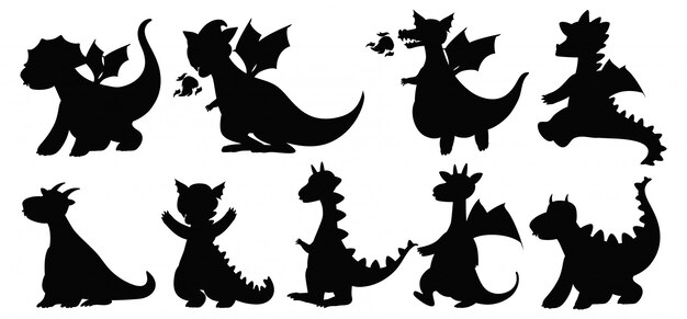 Verschillende draken in silhouet geïsoleerd op een witte achtergrond
