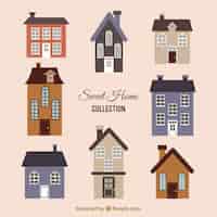 Gratis vector verzameling van mooie vintage huizen in plat design