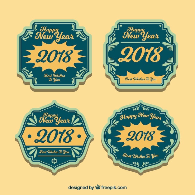 Gratis vector vintage nieuwjaar 2018 badge-collectie in het groen