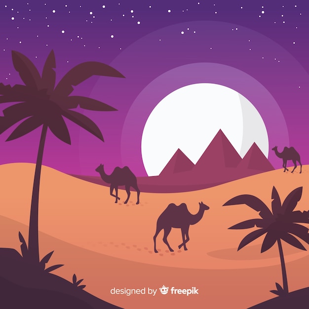Vlak de piramideslandschap van Egypte met caravan van kamelen
