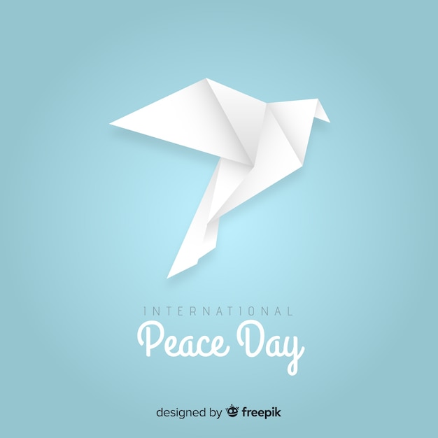 Gratis vector vredesdag concept met origami duif