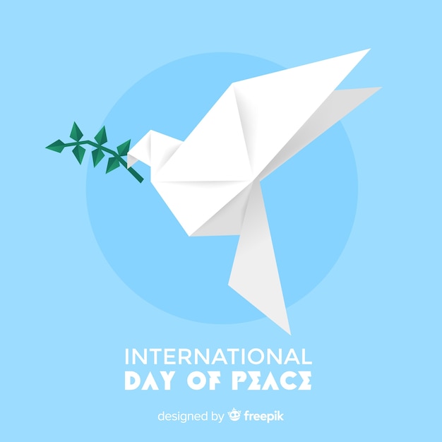 Vredesdag concept met origami duif