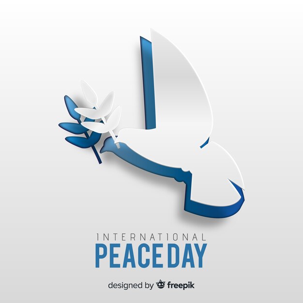 Vredesdag concept met papieren duif