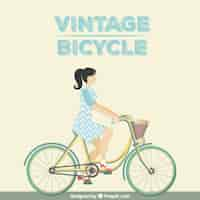 Gratis vector vrouw op een vintage fiets