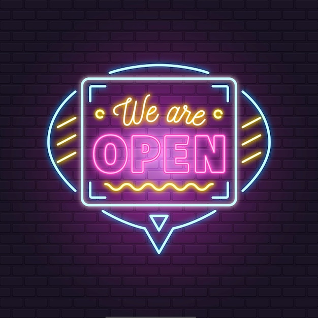 'we zijn open' neonreclame op bakstenen muur