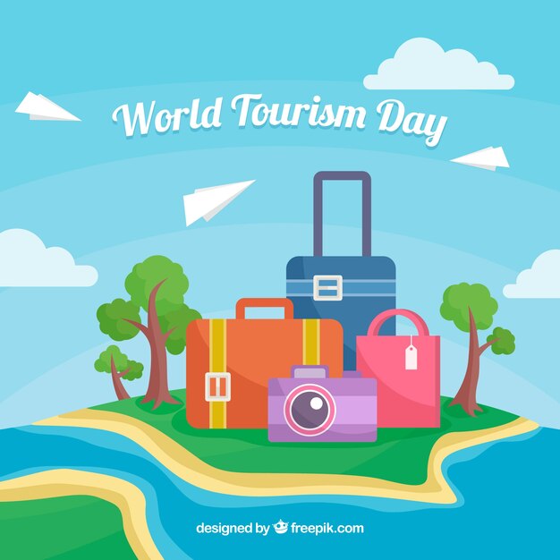 Wereld toeristiedag, eiland met koffer en een fotocamera