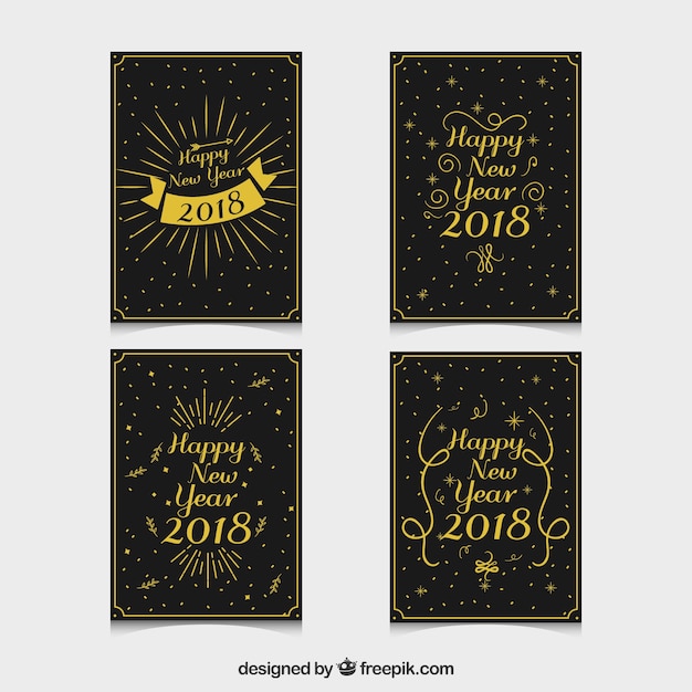 Gratis vector zwarte wenskaarten met gouden letters